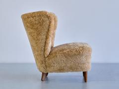 Johannes Brynte Pair of Johannes Brynte Lounge Chairs in Sheepskin and Ash Wood Sweden 1940s - 3325598