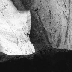 John Stathatos Earth VI Black and White Photograph Cave Rocks Natural Landscape Light - 3819056