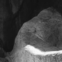 John Stathatos Earth VI Black and White Photograph Cave Rocks Natural Landscape Light - 3819057