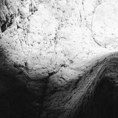 John Stathatos Earth VI Black and White Photograph Cave Rocks Natural Landscape Light - 3819058