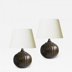 Just Andersen Pair of pumpkin form table lamps in patinated Disko by Just Andersen - 2199584