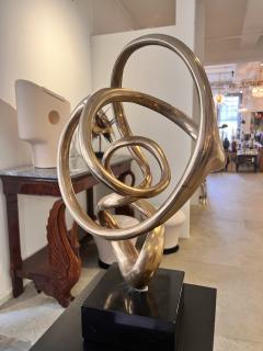 Kieff Antonio Grediaga Bronze sculpture of a twirling abstract form set on a black base - 3174811