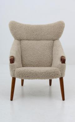 Kurt stervig Danish Lounge Chair in Sheepskin Model 55 by Kurt stervig - 1143499