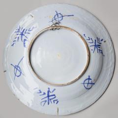 LARGE LATE 17TH CENTURY CIRCULAR FAIENCE CHARGER - 4388130