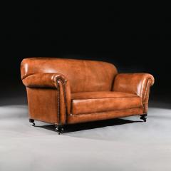 LATE VICTORIAN LEATHER UPHOLSTERED DROP ARM SOFA - 1840500