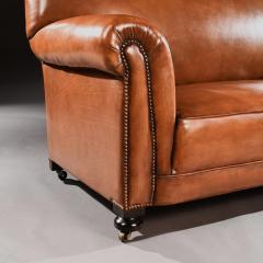 LATE VICTORIAN LEATHER UPHOLSTERED DROP ARM SOFA - 1840506