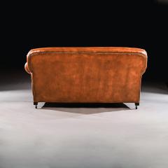 LATE VICTORIAN LEATHER UPHOLSTERED DROP ARM SOFA - 1840507