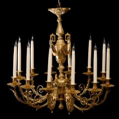 LOUIS XVI STYLE GILT BRONZE TWELVE LIGHT CHANDELIER - 696259