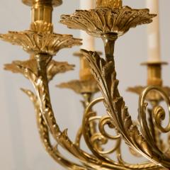 LOUIS XVI STYLE GILT BRONZE TWELVE LIGHT CHANDELIER - 696262