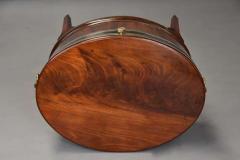 Large 18thc mahogany brass bound oval cellarette of fine patina - 4806082