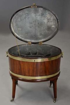 Large 18thc mahogany brass bound oval cellarette of fine patina - 4806084