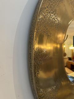 Large circular mirror with concave and textured brass surround - 3546026