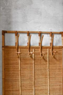 Large wall coat hanger in rush and wicker Italy 1980 - 3548462