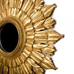 Line Vautrin A small gilt wood sunburst mirror in the manner of Line Vautrin - 1697419