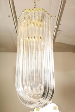 Long Mid Century Curved Lucite Ribbon Chandelier in Brass - 1663479