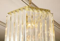 Long Mid Century Curved Lucite Ribbon Chandelier in Brass - 1663488