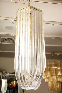 Long Mid Century Curved Lucite Ribbon Chandelier in Brass - 1663490