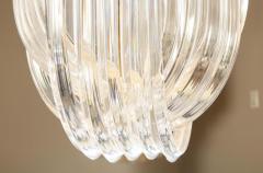 Long Mid Century Curved Lucite Ribbon Chandelier in Brass - 1663492