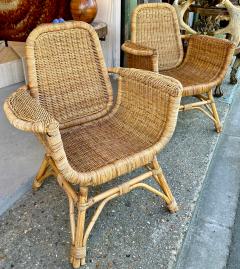 Louis Sognot Louis Sognot refined pair of rattan arm chairs in good vintage condition - 3099918