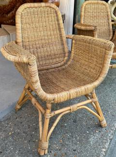 Louis Sognot Louis Sognot refined pair of rattan arm chairs in good vintage condition - 3099919