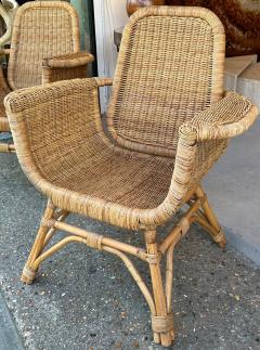 Louis Sognot Louis Sognot refined pair of rattan arm chairs in good vintage condition - 3099920