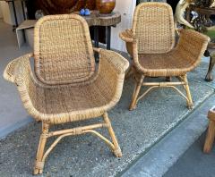 Louis Sognot Louis Sognot refined pair of rattan arm chairs in good vintage condition - 3099922