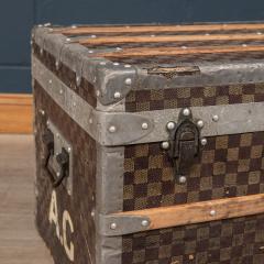 Sold at Auction: An early 20th century Louis Vuitton trunk, the lid with a  brass plaque inscribed 'Princess Victoria of Schleswig Holstein', with LV  logo embossed cloth covering, timber straps and leather