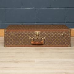 Lot - Louis Vuitton, (1821-1892, French), A vintage small Breveté suitcase  trunk, circa 1926-1954, Interior embossed paper label (damaged): P