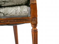 Louis XVI Style Walnut Caned Needlepoint Lounge Chairs - 3077129