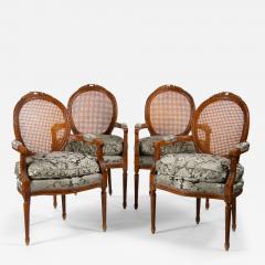 Louis XVI Style Walnut Caned Needlepoint Lounge Chairs - 3078418