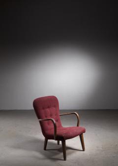 Lounge chair with curved armrests and red upholstery Denmark 1940s - 2719426