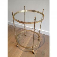 MID CENTURY BRASS ROUND ROLLING SERVING TABLE WITH ACORN FINIALS BOTTLE RACK - 795619
