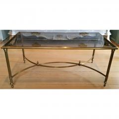 MID CENTURY BRASS SMOKED GLASS COFFEE TABLE WITH CURVED STRETCHER - 795952