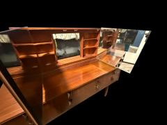 MID CENTURY ILLUMINATED SIX DRAWER WALNUT VANITY WITH SIDE PULL OUT MIRRORS - 4485560