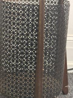MID CENTURY PERFORATED METAL AND WOOD THREE LEGGED TRASH CANNISTER - 4276233