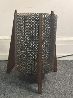 MID CENTURY PERFORATED METAL AND WOOD THREE LEGGED TRASH CANNISTER - 4276235