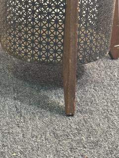 MID CENTURY PERFORATED METAL AND WOOD THREE LEGGED TRASH CANNISTER - 4276236