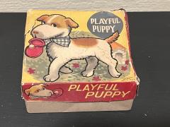 MID CENTURY PLAYFUL PUPPY KEY WIND DOG WITH SHOE TOY - 3331783