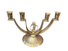 MODERNIST PAIR OF ART DECO SILVERED CANDELABRA WITH STYLIZED CHERUB IN RING - 4607995
