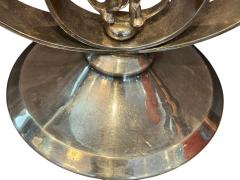 MODERNIST PAIR OF ART DECO SILVERED CANDELABRA WITH STYLIZED CHERUB IN RING - 4607998