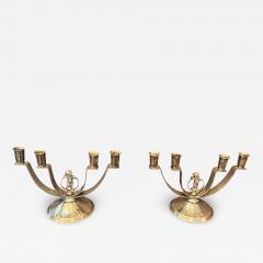MODERNIST PAIR OF ART DECO SILVERED CANDELABRA WITH STYLIZED CHERUB IN RING - 4608027