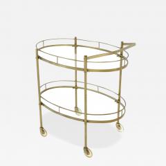MODERNIST TWO TIER OVAL BRASS GLASS BAR CART - 4475639