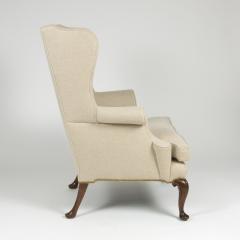 Mahogany Frame Upholstered Wing Chair With Rams Head Carved Legs - 1363660