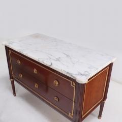 Maison Jansen A Pair of Louis XVI style marble top mahogany commodes signed Jansen C 1940  - 4010824