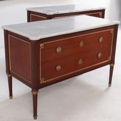 Maison Jansen A Pair of Louis XVI style marble top mahogany commodes signed Jansen C 1940  - 4010825