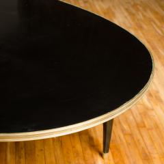 Maison Jansen A large oval ebonized and bronze mounted dining room table by Jansen circa 1945 - 1739146