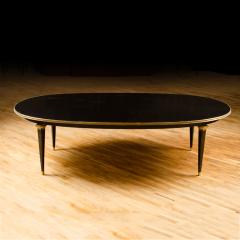 Maison Jansen A large oval ebonized and bronze mounted dining room table by Jansen circa 1945 - 1739148