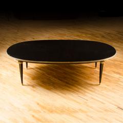 Maison Jansen A large oval ebonized and bronze mounted dining room table by Jansen circa 1945 - 1739157