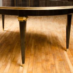 Maison Jansen A large oval ebonized and bronze mounted dining room table by Jansen circa 1945 - 1739219