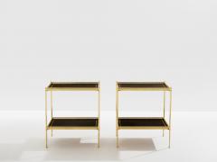 Maison Jansen Maison Jansen pair of two tier side tables brass black leather 1960s - 4446677